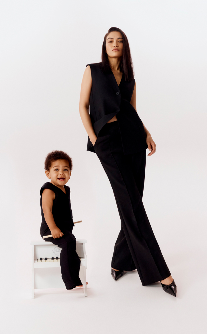 Shanina in black wool blend single-breasted vest and black full length straight leg trouser