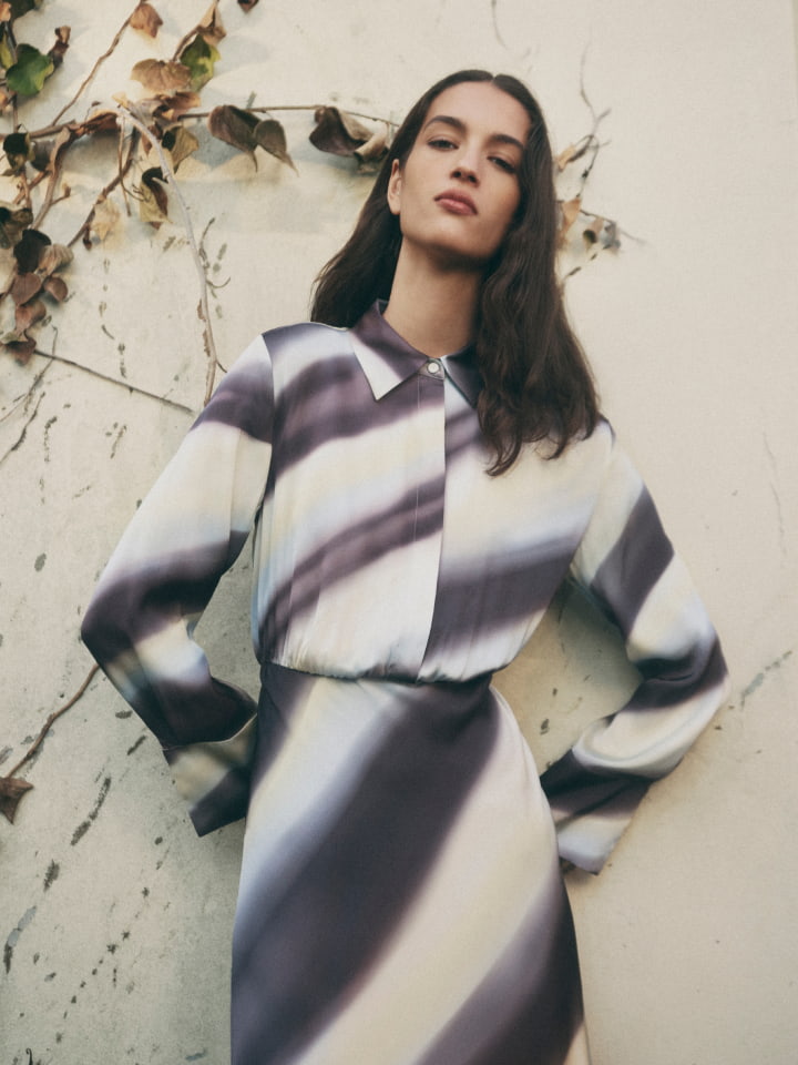 Woman wearing the eclipse blue split maxi shirt dress and lemon scarlett mules